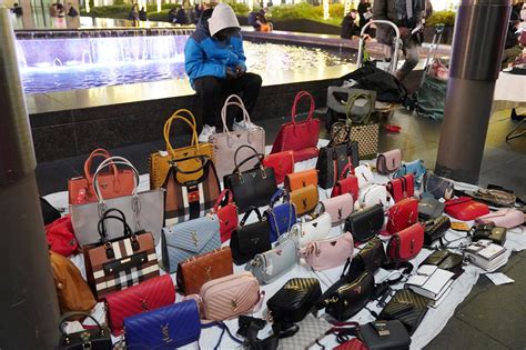 are fake designer clothes illegal if you know its fake|selling counterfeit designer bags.